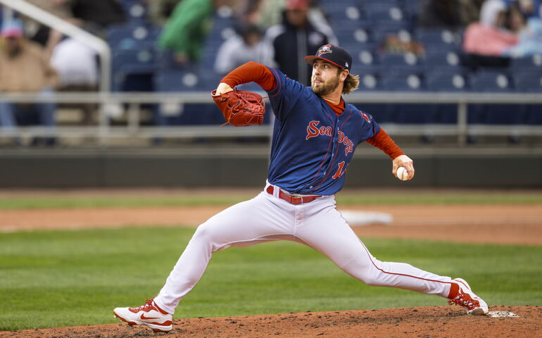 Sea Dogs pitcher in action at a game in Portland.