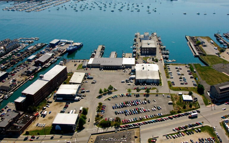 aerial of wharf and buildings and cars