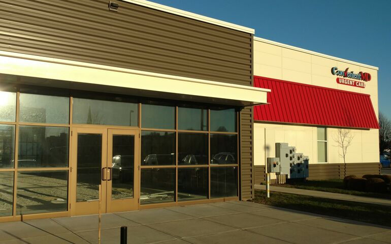 exterior of vacant office space with glass front