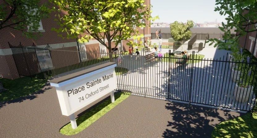 An exterior view of a sign and a fence.