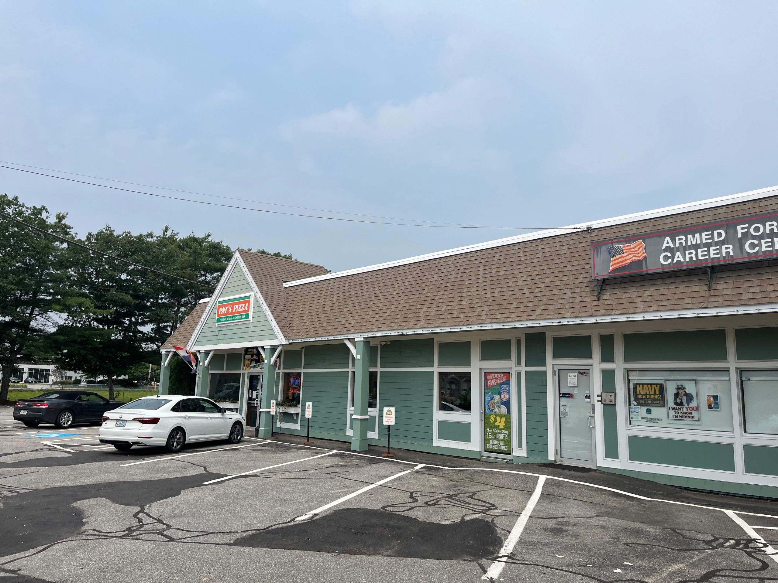 retail buildings and cars