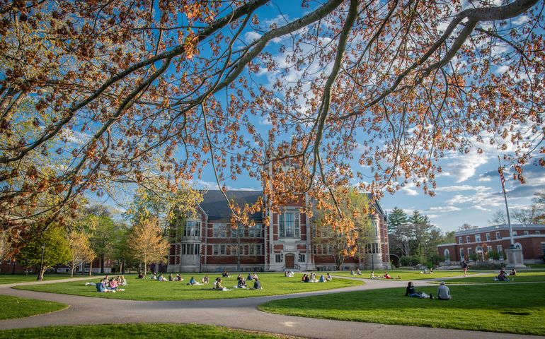 Bowdoin campus exterior with students in foreground