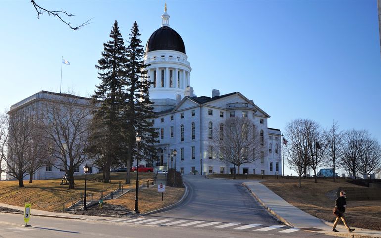 a large building with a copper dome on top