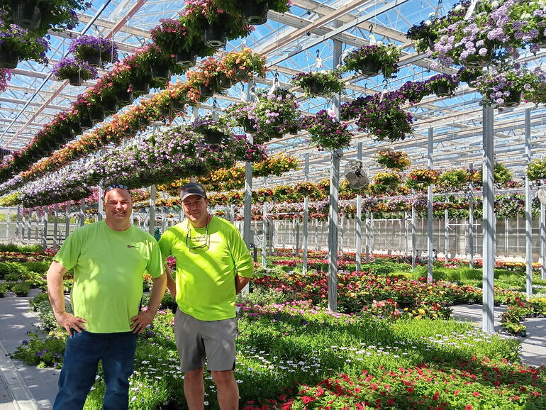 two men in the new greenhouse