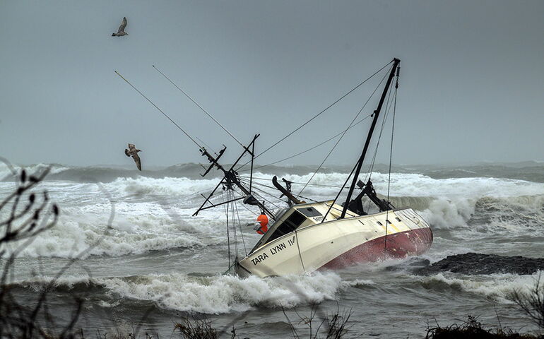 Tara Lynn II fishing vessel on rough waters during a storm.