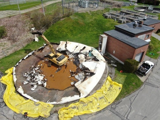 An aerial view shows work underway on a round footprint.