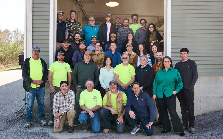 A group of people pose for a photo.