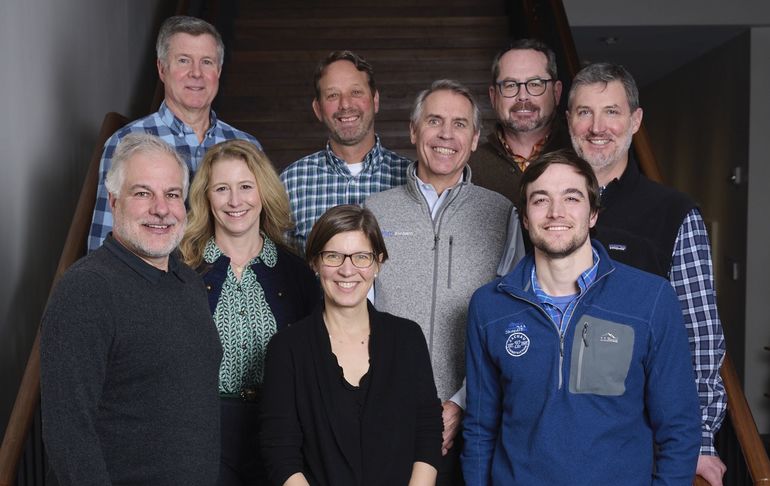 people posed on stairway