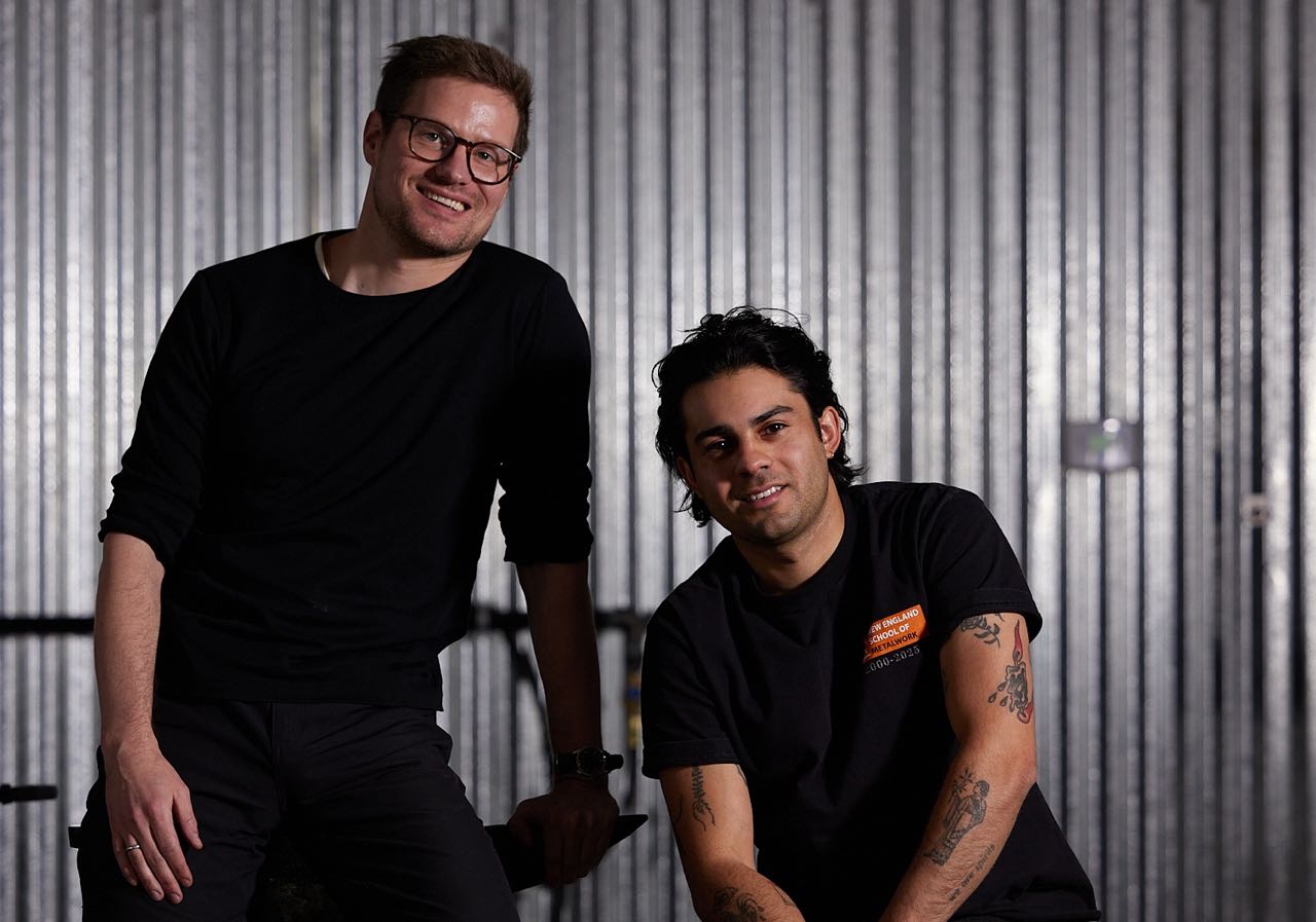 Two people pose for a photo.