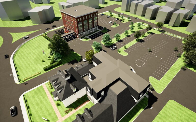 A rendering shows buildings and a parking lot.