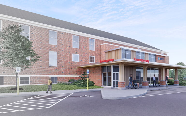 A rendering shows a brick building and walkway.