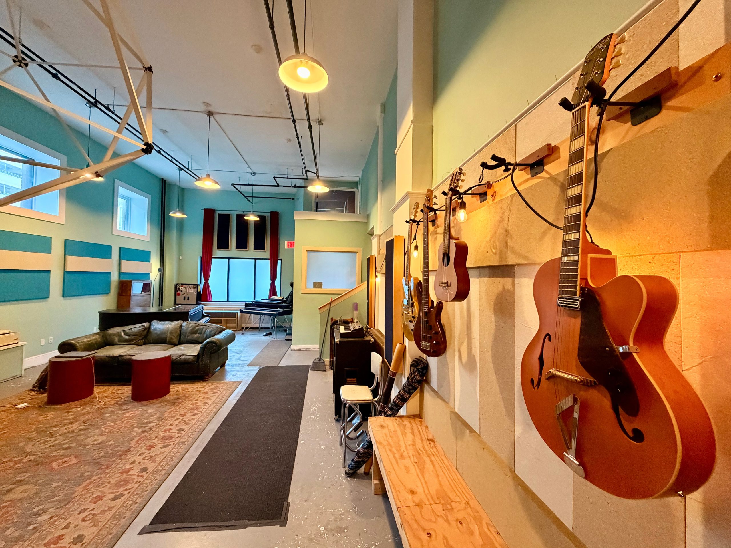 A room has musical instruments.