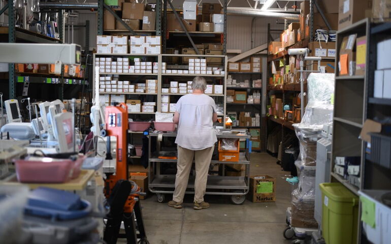 A person works in a warehouse.