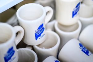 white and blue mugs
