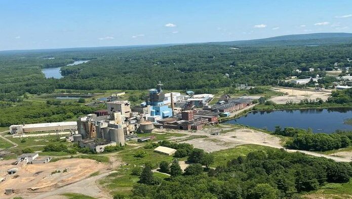 An aerial view shows industrial bulidings.