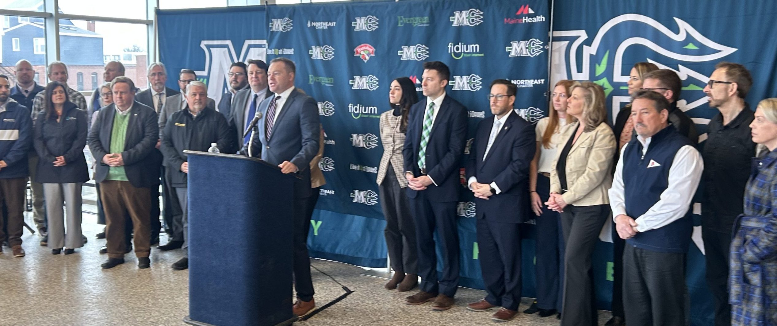 Patrick Woodcock and business leaders at press conference in Portland
