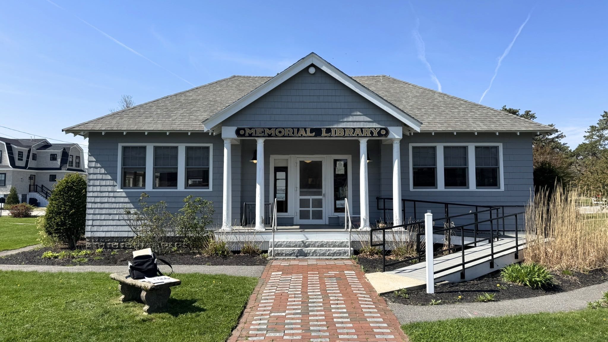 A building has a well-tended walkway.