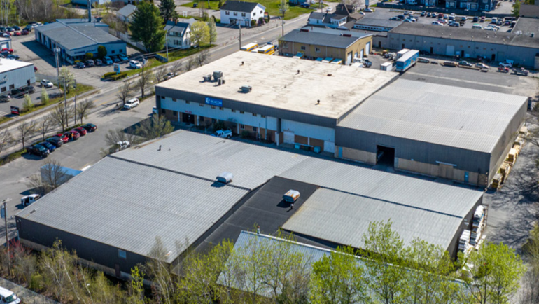 An aerial view of industrial buildings.