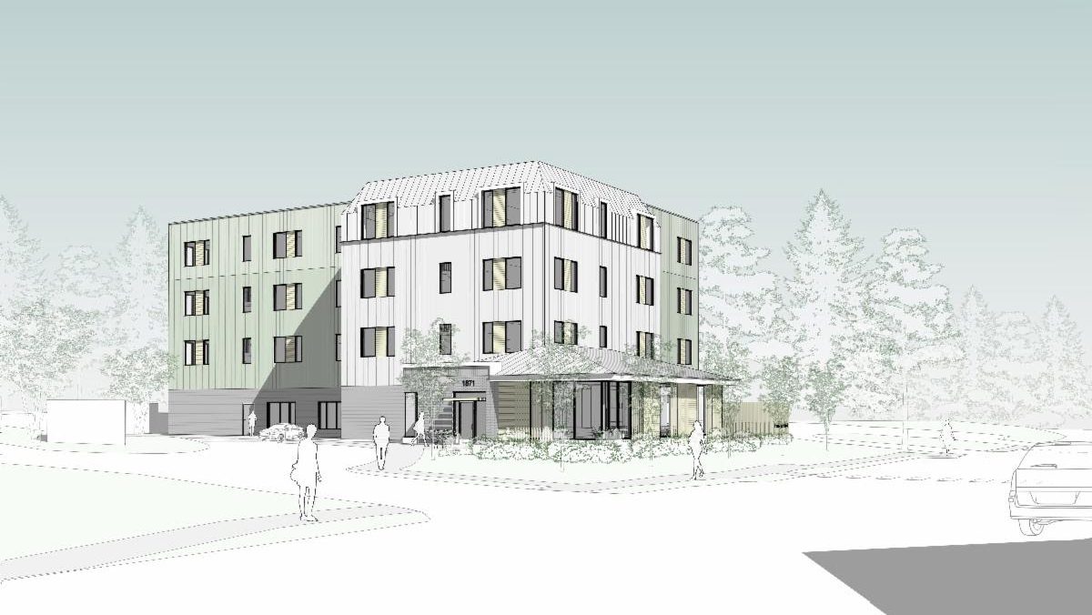 A multi-story building with a white facade.