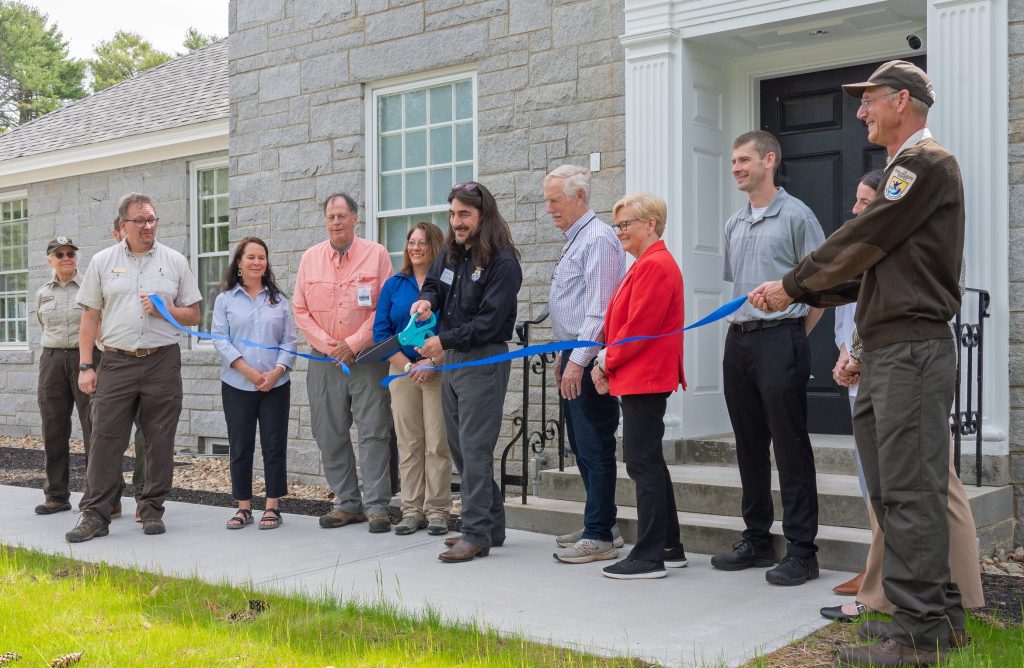 people at a ribbon cutting