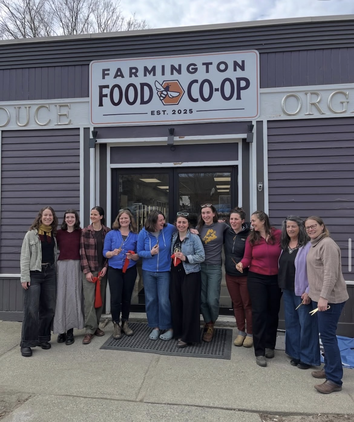 employees outside Farmington Food Co-op building