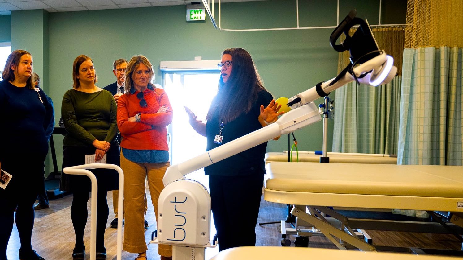 People look at equipment.